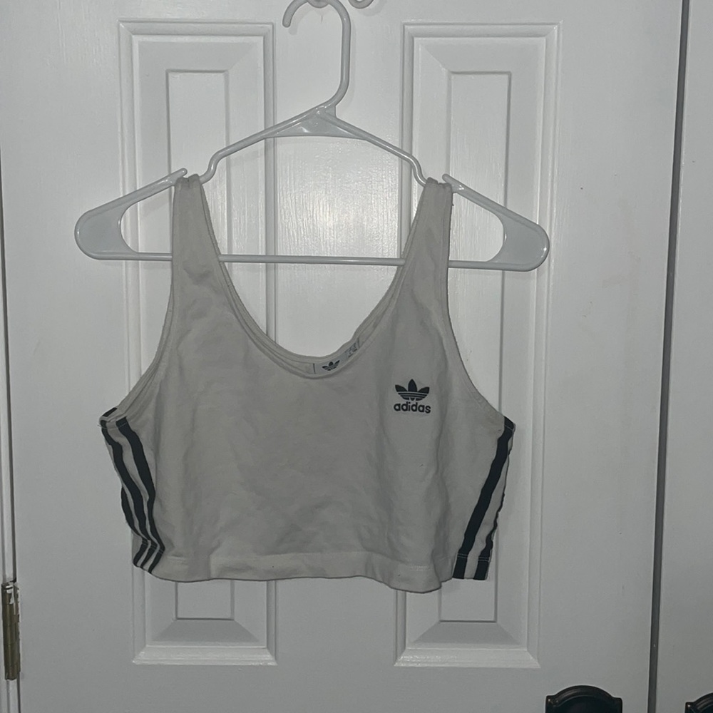 Adidas white and black striped M top.
